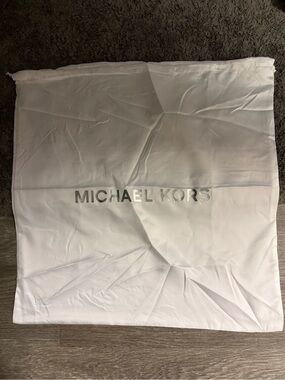 Brand new never used Michael Kors XL Dust Bag
